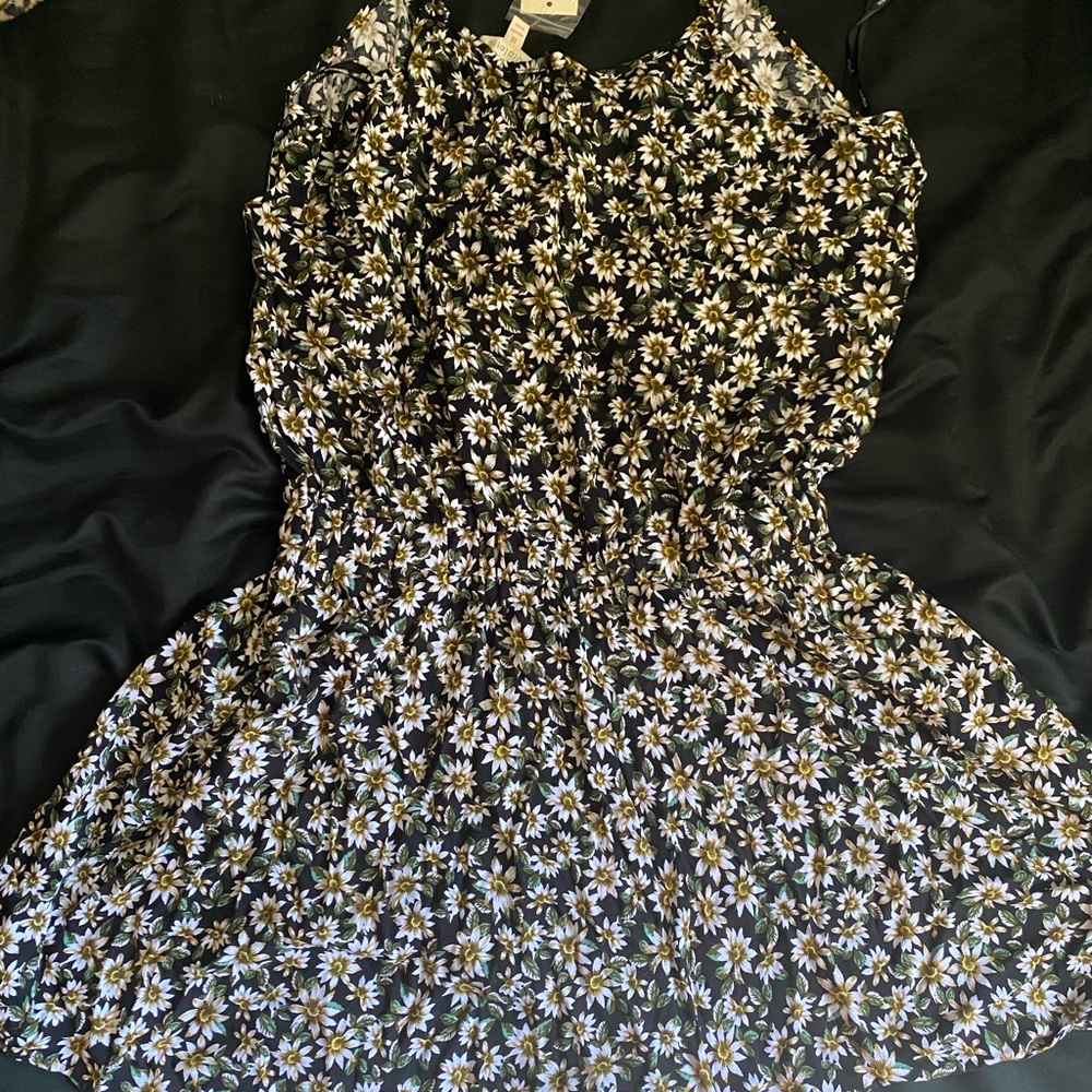 Floral romper. Brand new.